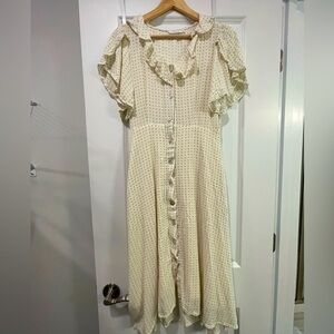 Beige button-up, midi dress that is soft and perfect for spring.